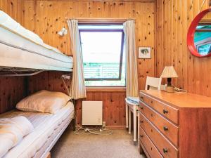 Ένα ή περισσότερα κρεβάτια σε δωμάτιο στο 6 person holiday home in Store Fuglede-By Traum