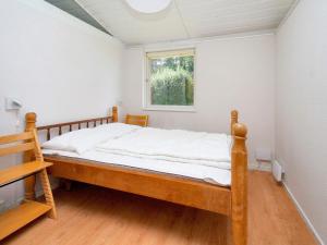 Ένα ή περισσότερα κρεβάτια σε δωμάτιο στο Tranquil Retreat at Overby Lyng-By Traum