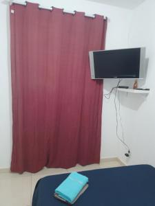 TV a/nebo společenská místnost v ubytování Casa suite em viracopos