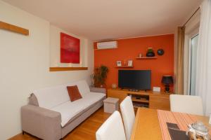 Μια τηλεόραση ή/και κέντρο ψυχαγωγίας στο Dalma Residence apartman Girandella