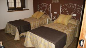 Säng eller sängar i ett rum på Casa rural el Molino del Botero