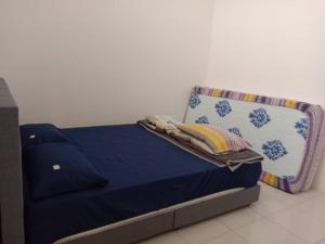 Ένα ή περισσότερα κρεβάτια σε δωμάτιο στο 11 Homestay