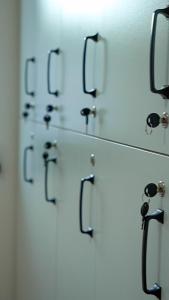 a row of lockets on a wall in a bathroom at Blissvale - Celebrations Galore in Dzoraghpʼyur