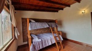 Giường trong phòng chung tại Excellent Home Near Rosarito Beach