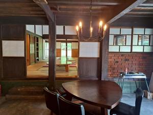 Ένα ή περισσότερα κρεβάτια σε δωμάτιο στο コテージフラミンゴ