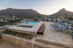 a swimming pool on the roof of a building at Pepperclub Hotel in Cape Town