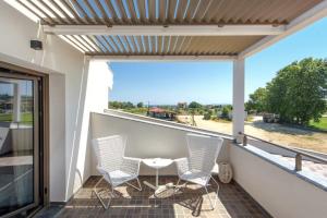 Fotografie z fotogalerie ubytování Corali luxury villas v destinaci Ierissós