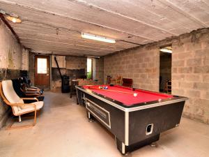 a room with a pool table in a building at Modern Holiday Home in Meyerode with Terrace in Meyerode