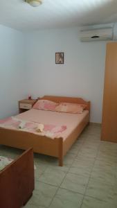 Ένα δωμάτιο στο Apartmani Rosa