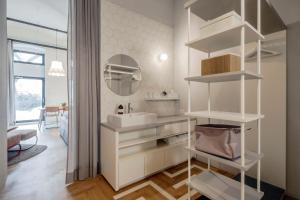 Postel nebo postele na pokoji v ubytování grätzlhotel Karmelitermarkt + 37 fotografií