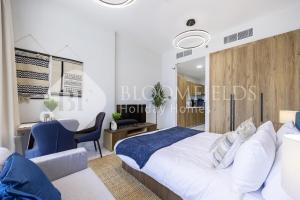 En eller flere senge i et værelse på Bloomfields Fantastic Stu In Al Maryah