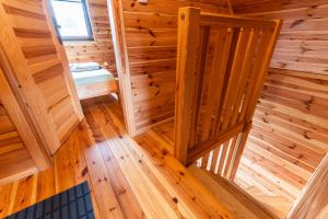 an inside view of a wooden room with a sauna at Słoneczny Zakątek in Sztutowo +14 photos