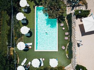 an overhead view of a swimming pool at a resort at Terra di Ea in Tortoreto Lido