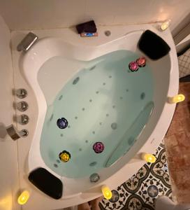 a bath tub with stickers on the inside of it at El Secret de la LLegenda La Princesa in Vilavert