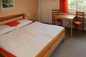 Postel nebo postele na pokoji v ubytování Pension Hendling