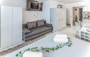 a living room with a couch and a table at Luna & Stella Apartments, Sankt Englmar in Sankt Englmar