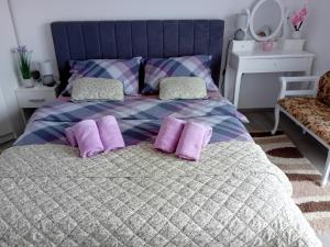 Postel nebo postele na pokoji v ubytování Apartmani Ani + 79 fotografií