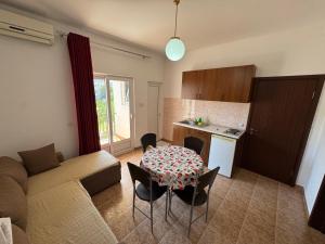 Kuchyň nebo kuchyňský kout v ubytování Apartments Marniković