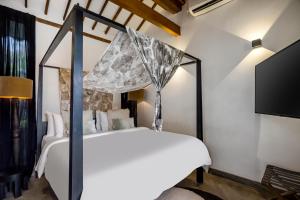 Postel nebo postele na pokoji v ubytování Bloom Resort Bali by BaliSuperHost