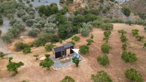 an aerial view of a house with trees at La Vista Huma by Tiny Away in Alora