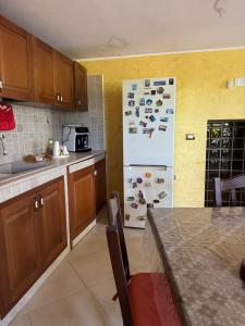 Η κουζίνα ή μικρή κουζίνα στο Luci della Murgia - Villa +13 φωτογραφίες