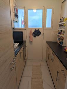 Una cocina o cocineta en Appartement avec balcons et salle à manger 7 fotos más