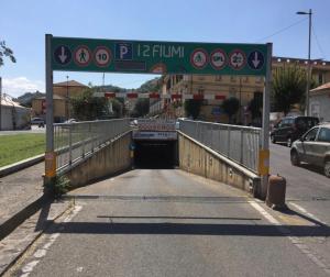 a bridge over a road with a sign on it at Incanto in Cosenza