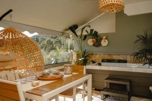 a kitchen with a table and a sink at Julys House in Parga