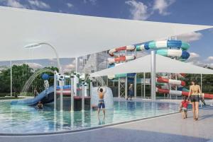 Grandview House Private 2Bed 2Bath Melb Airport في ملبورن: حديقة مائية مع أشخاص يلعبون في الماء