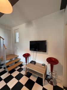 TV a/nebo společenská místnost v ubytování Apartment Luxury Ofelia + 10 fotografií