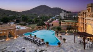 an image of a swimming pool on the roof of a hotel at Turban Roopgarh Resort and Spa, Udaipur in Udaipur