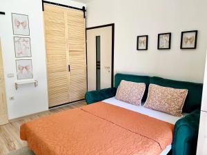 Ένα ή περισσότερα κρεβάτια σε δωμάτιο στο Summer Studio