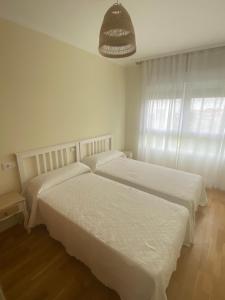 Postel nebo postele na pokoji v ubytování Piso acogedor Rías Baixas