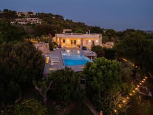 an aerial view of a house with a swimming pool at Villa Modigliani in Casarano