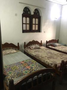 Ένα ή περισσότερα κρεβάτια σε δωμάτιο στο Pala House