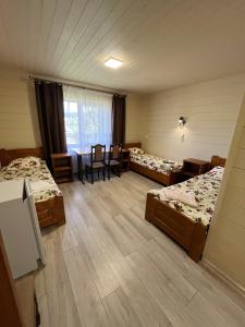 Postel nebo postele na pokoji v ubytování Hotels mim