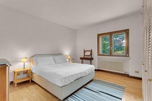 Ένα ή περισσότερα κρεβάτια σε δωμάτιο στο Garden Villa - Fly & Sport - With Parking
