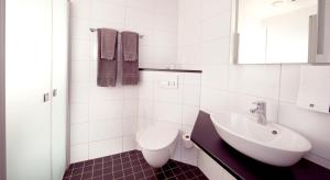 Ett badrum på Clarion Collection Hotel Bolinder Munktell