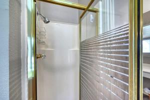 a shower with a glass door in a bathroom at StunningHome on The Blanco River in Flugrath +41 photos