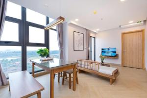 TV a/nebo společenská místnost v ubytování Aria Hotel & Resort Vũng Tàu - Căn Hộ & Villa Mặt Biển Booking 24h