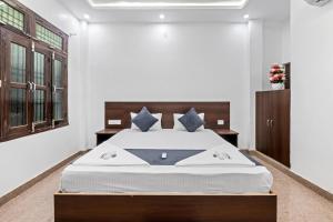 Ένα ή περισσότερα κρεβάτια σε δωμάτιο στο Hotel GrandVeer