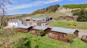 an aerial view of a estate with houses at Douglas Fir Lodge with Hot tub in Cupar