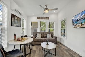 a living room with a couch and two tables at Resort at Fredericksburg Unit 24 in Rocky Hill