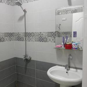 a bathroom with a sink and a mirror at Hurghada Red Sea Apartments in Hurghada +11 photos