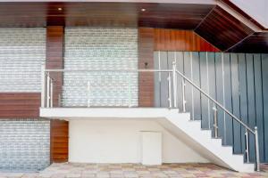 a staircase leading up to a building at Hotel O Kalyanpur Near IIT Kanpur in Kānpur