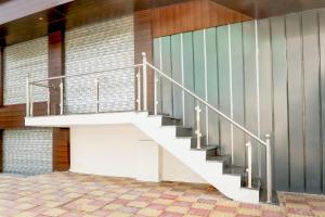 a staircase in the side of a building at Hotel O Kalyanpur Near IIT Kanpur in Kānpur