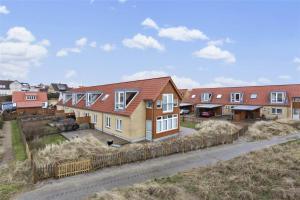 an aerial view of a house with hay at 1167-N-Hundested-Kattegat-Strandhave-38 in Hundested