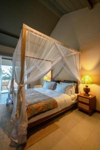 Postel nebo postele na pokoji v ubytování Rekawa Wellness Resort