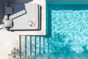 an overhead view of a swimming pool at SENTIDO Apollo Palace in Mesongi