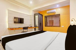 Fotografie z fotogalerie ubytování Super Townhouse Cantonment Varanasi Formerly Sarin Inn v destinaci Váránasí + 55 fotografií